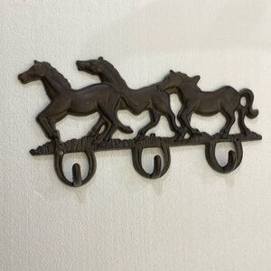 vintage cast iron three horses running, triple hooks